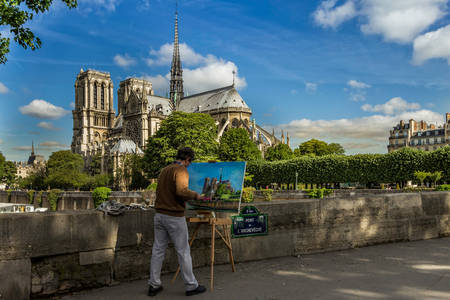 A művész festi a Notre Dame-székesegyházat