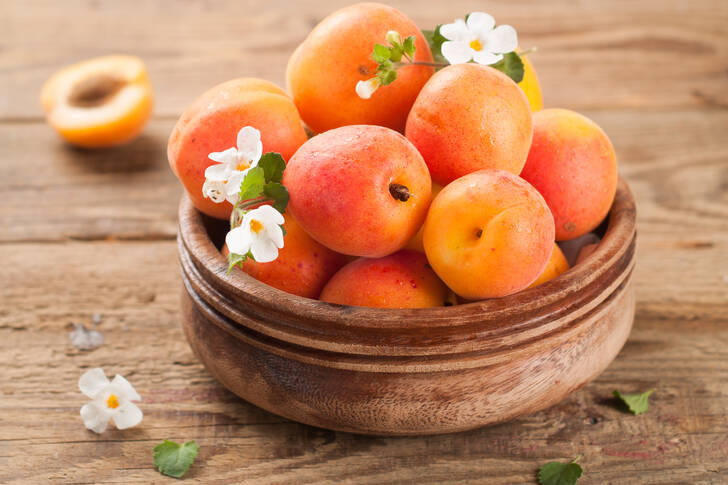 Apricots in a wooden bowl