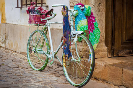 A vintage bicycle by the house