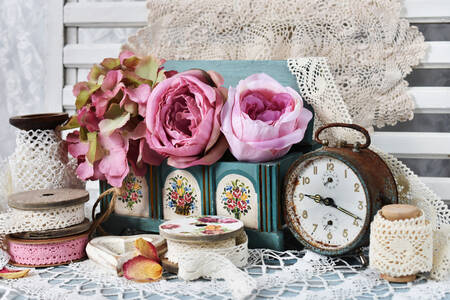 Old alarm clock and flowers