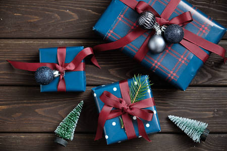 Christmas gifts on a wooden table