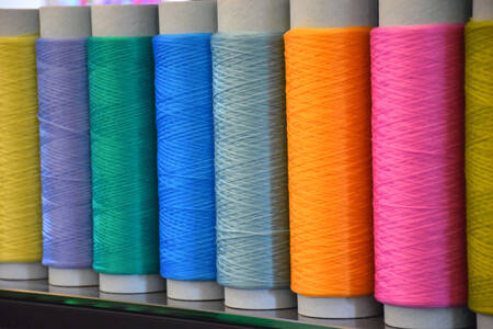 Set of sewing threads in different colors