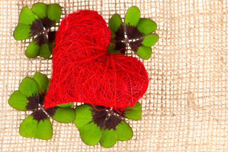 Red heart and clover on burlap