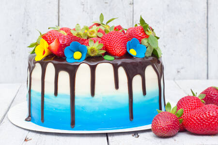 Blue and white cake with strawberries