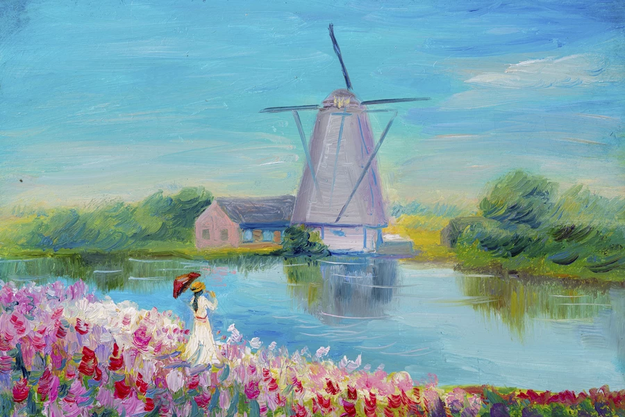 Un moulin à vent sur la berge du fleuve
