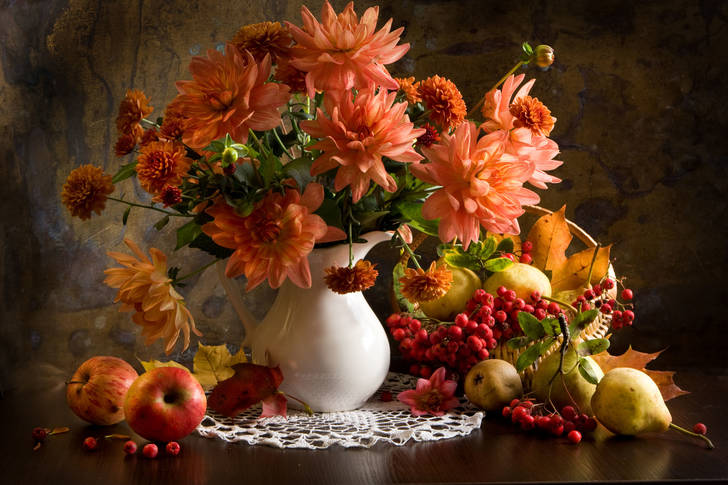 Dahlia bouquet and fruits on the table