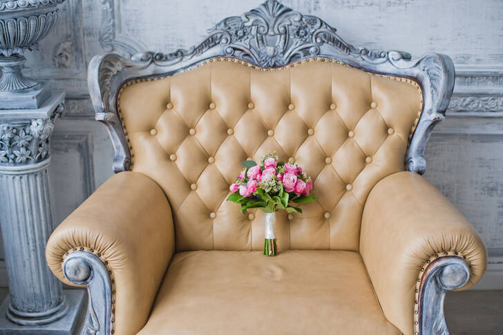 Wedding bouquet on an armchair