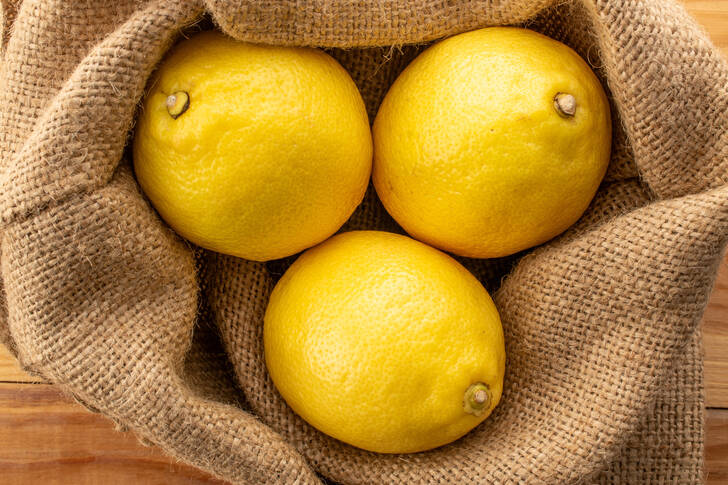 Three lemons in a bag