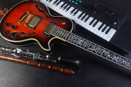 Guitarra eléctrica, clarinete y flauta