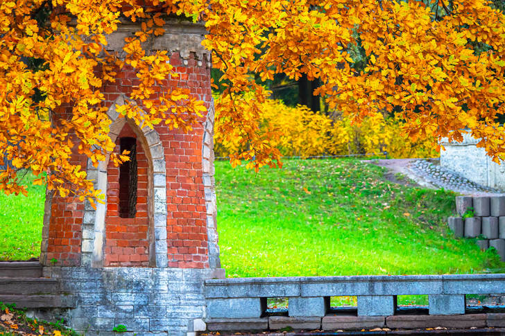Brick tower in autumn park