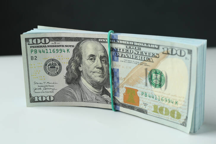 A stack of dollar bills