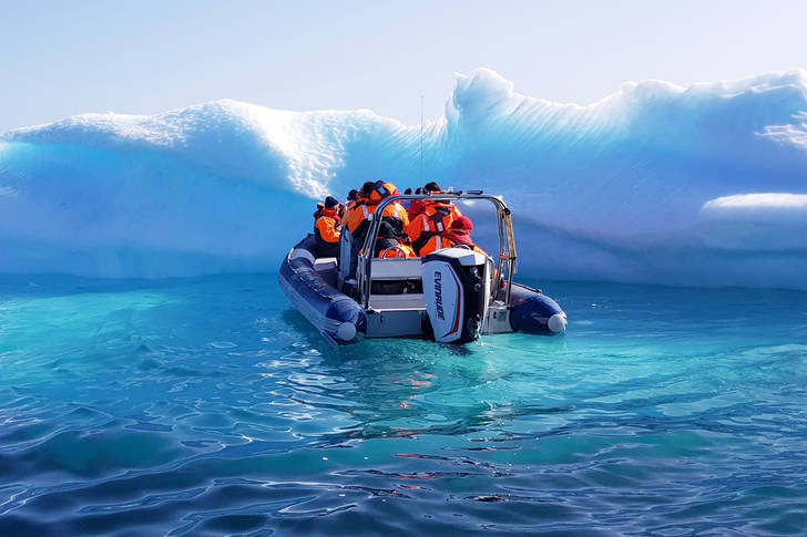 Boat among icebergs