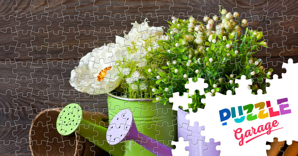 Gardening tools and flowers in watering cans Jigsaw Puzzle (Plants