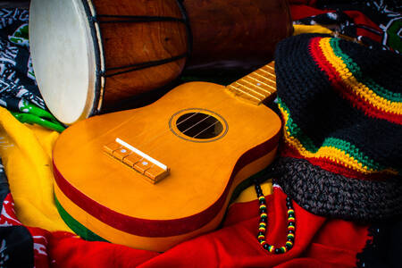 Gitaar en drum op felle stoffen
