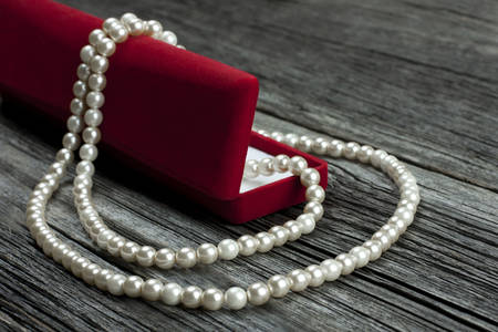 Pearl necklace on a velvet box