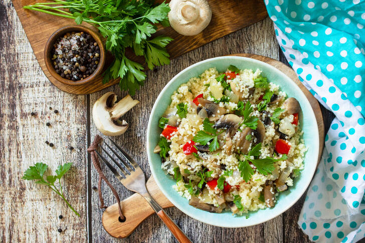 Salad with couscous and champignons