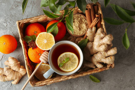 A basket of tea, ginger and oranges