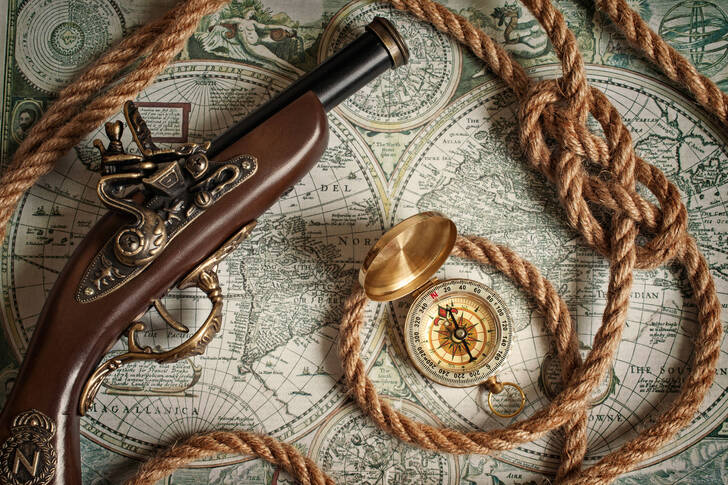 Pirate musket, compass and rope