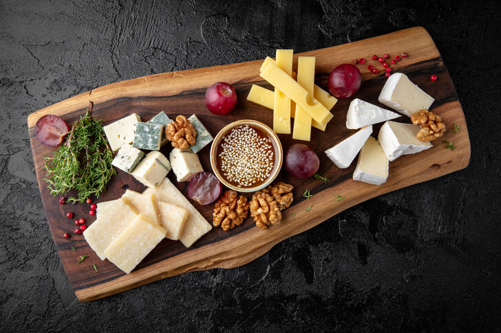 Cheese and nuts on a board