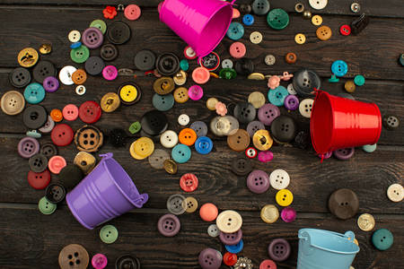 Buttons on a wooden table