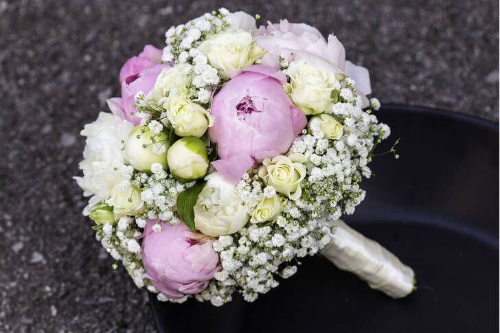 Wedding bouquet of peonies and roses