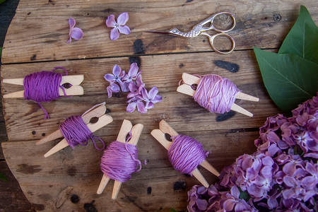 Purple threads and lilac flowers