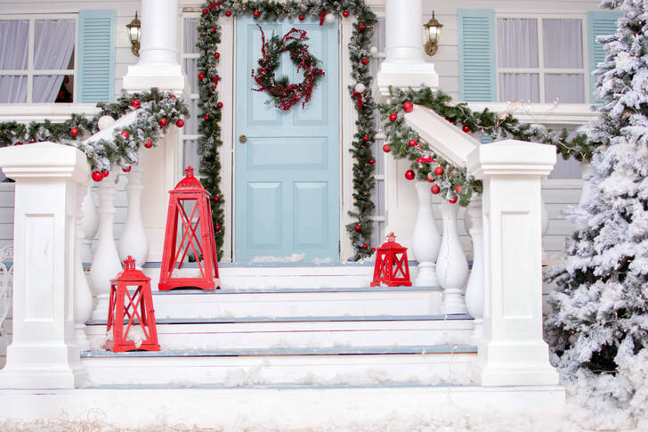 Porch of a house with garlands