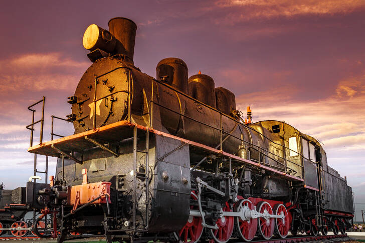 Steam locomotive against the sunset