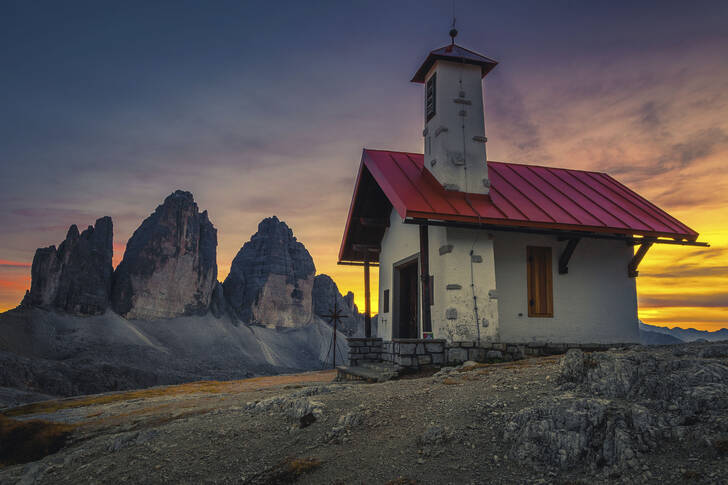 Chapel with the Tre Cime di Lavaredo mountains in the background