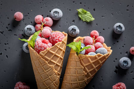 Frozen berries in a waffle cone