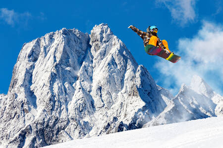 Snowboarder jumping