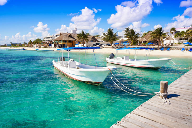 Boats on the beach in Puerto Morelos