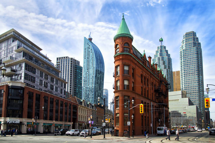 Gooderham building against the backdrop of skyscrapers