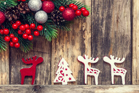 Christmas toys on wooden background