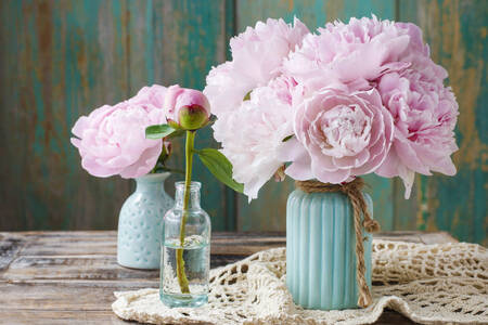 Pink peonies in vases