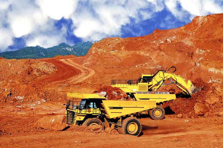 Excavator and truck in a quarry