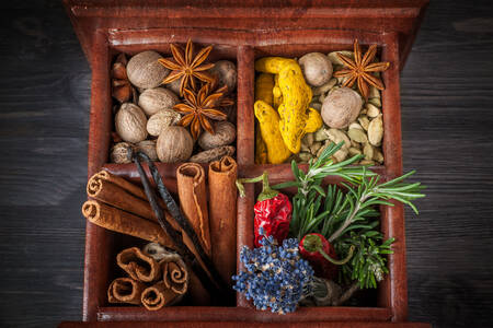 Spices and herbs in a wooden box
