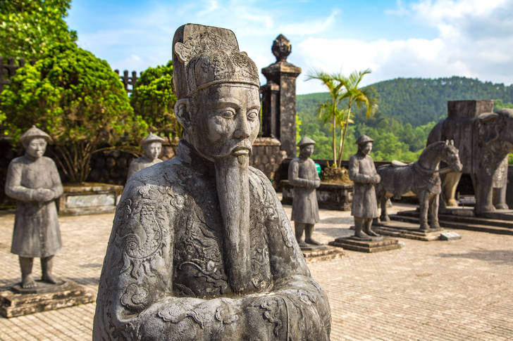 Sculptures of warriors in front of the tomb of Khai Dinh