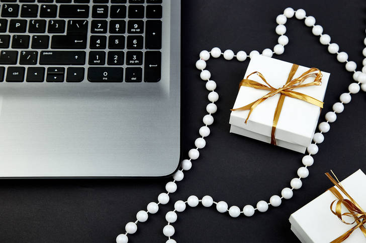 Beads near laptop