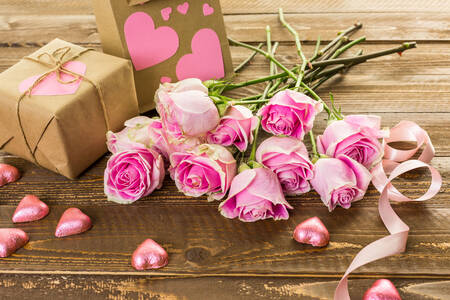 Ροζ τριαντάφυλλα και δώρο