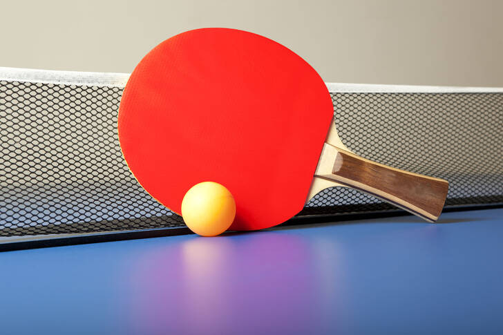 Table tennis racket and ball