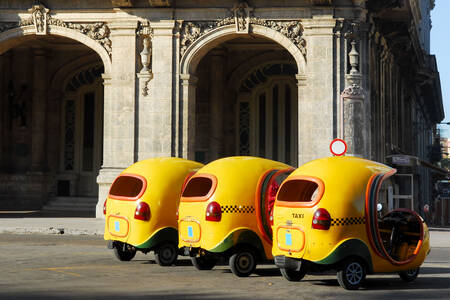 A yellow taxi in central Havana