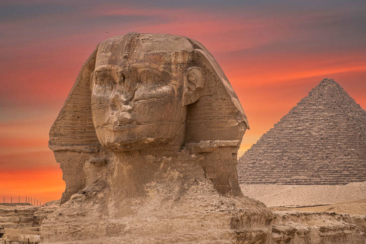 Sphinx against the background of the Cheops pyramid
