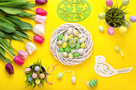 Easter eggs on a yellow background