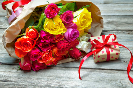 Bouquet of roses and a gift
