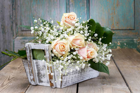 Roses in a wooden box