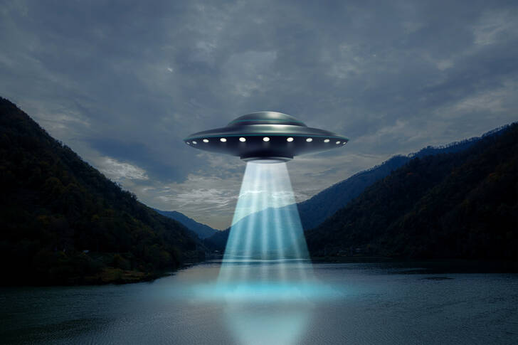 Alien spaceship over the lake