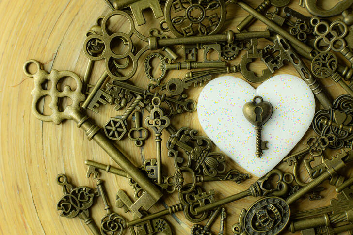 Antique keys and a white heart