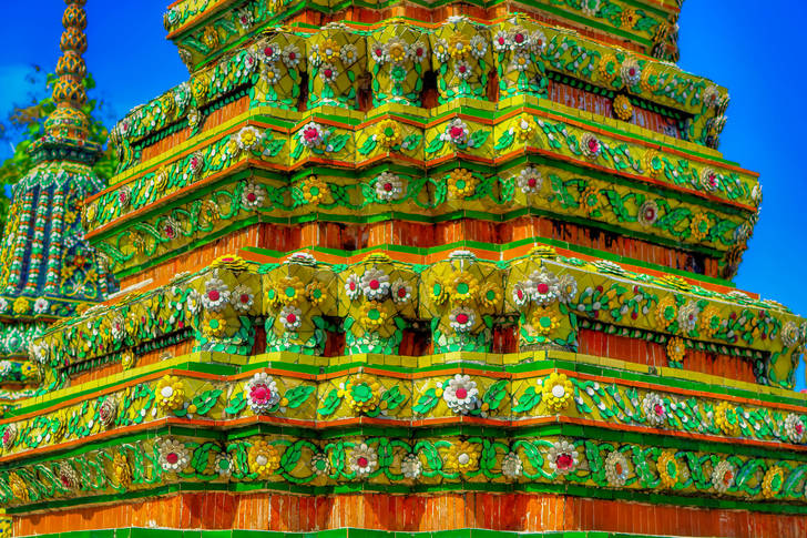 Colorful decorations on the walls of a Buddhist temple