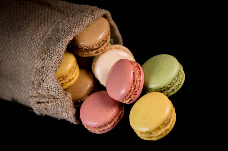 Macarons on a black background